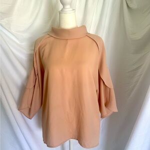 Blouse purchased with a Christian Dior tag not sure it’s an original